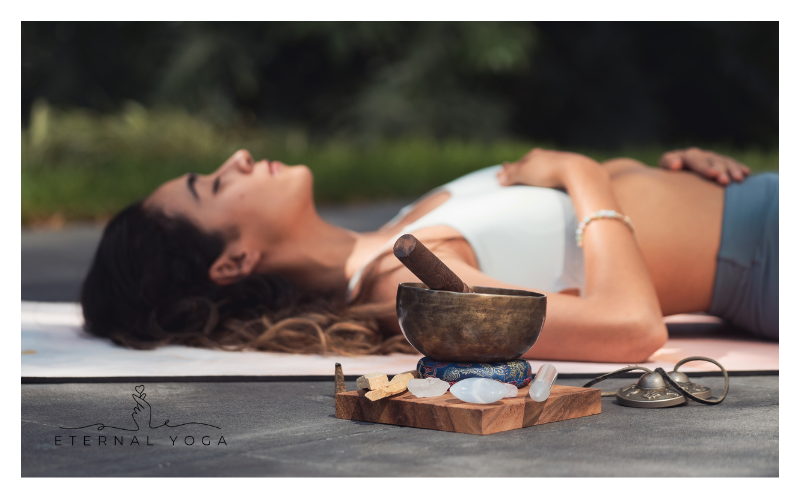 a lady doing sleep yoga pose