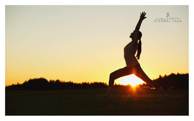 a women doing sun salutation yoga pose