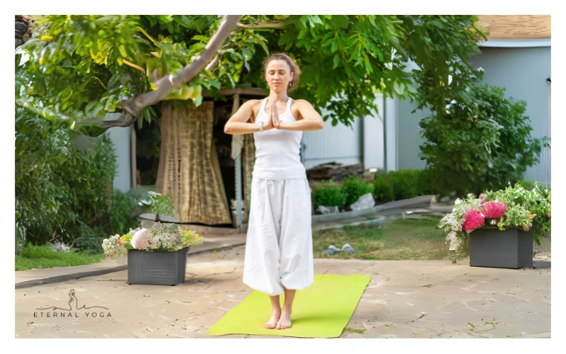 sun salutation prayer pose 2
