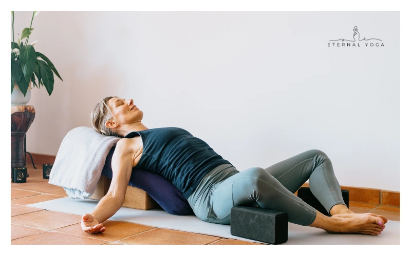 women doing yoga with props