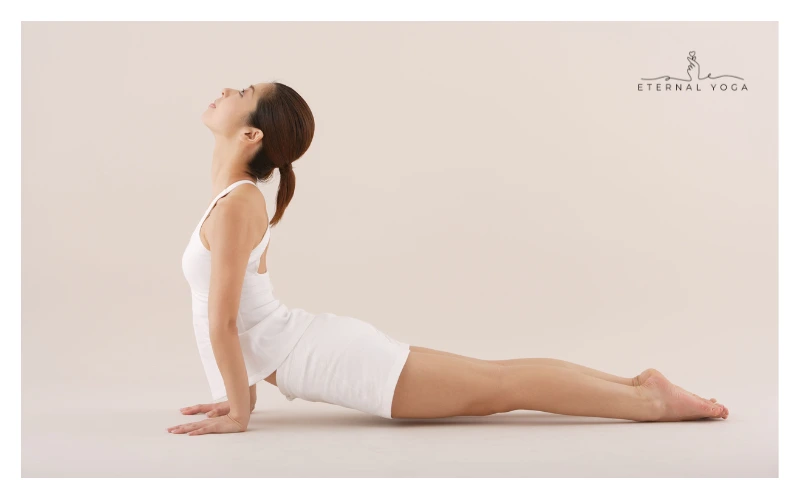women doing cobra pose for running strength