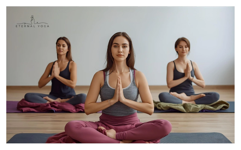 women's doing yoga with blanket